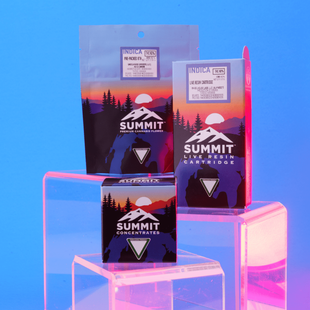 Summit cannabis products: pre-packed flower, live resin cartridge, and concentrate box on a clear stand.